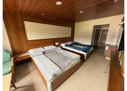 Letto o letti in una camera di Hotel Golden City