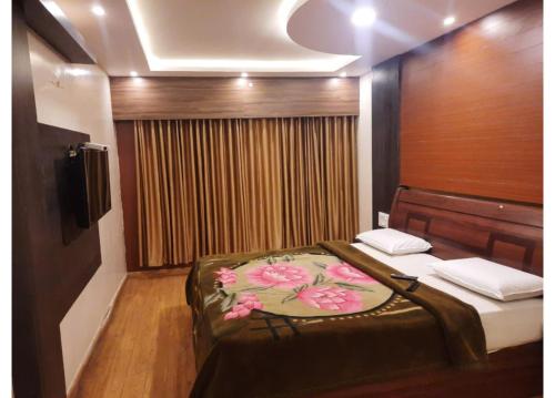 Letto o letti in una camera di Hotel Golden City
