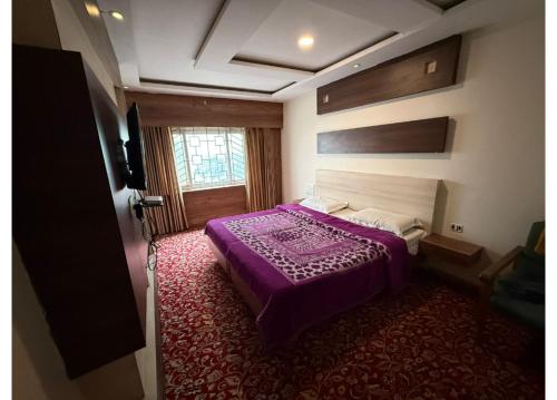 Letto o letti in una camera di Hotel Golden City