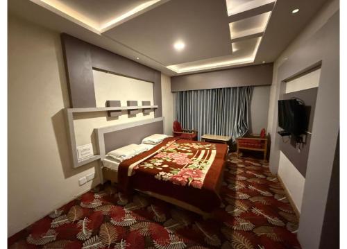 Letto o letti in una camera di Hotel Golden City