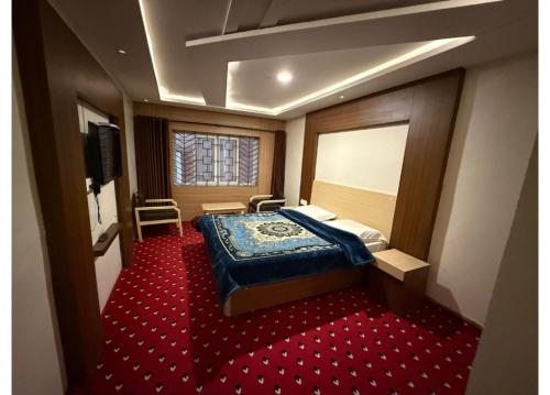 Letto o letti in una camera di Hotel Golden City