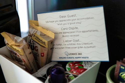 a sign in a drawer with food in it at Residenza Ticino by Quokka 360 - Modern Oasis near Bellinzona in Bellinzona