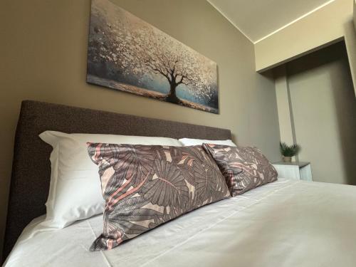 Postel nebo postele na pokoji v ubytování Palme Suites