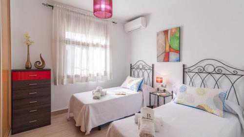 Postel nebo postele na pokoji v ubytování Villa Gamor Frigiliana by Ruralidays