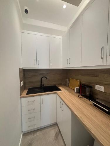 Dapur atau dapur kecil di Villa Mucenji