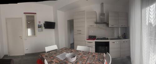 Kuchyň nebo kuchyňský kout v ubytování Relax Apartment Bergamo