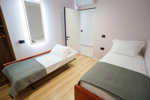 Postel nebo postele na pokoji v ubytování Ionian Premium Villas