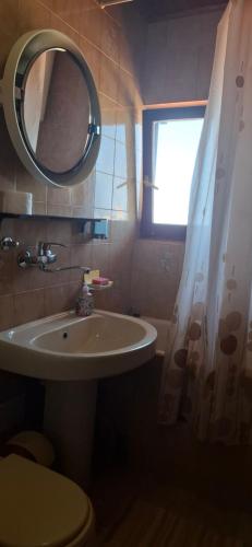 Un baño de Marko Apartments