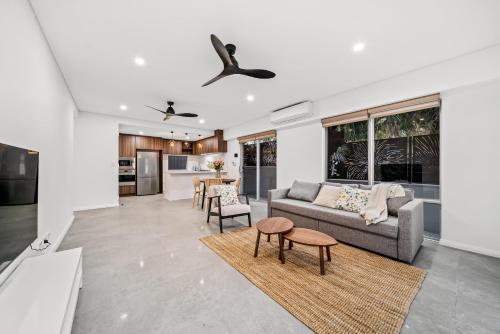 a living room with a couch and a table at Scarborough Escape, New 2Br Suite, 14G in Perth