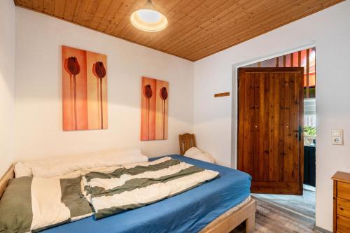 Ένα ή περισσότερα κρεβάτια σε δωμάτιο στο Bungalow 145