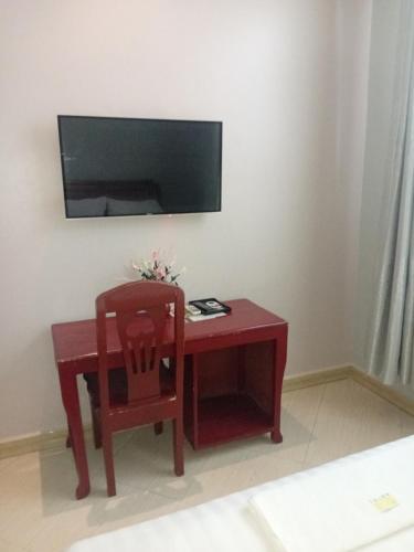 Televisyen dan/atau pusat hiburan di Rising Sun Hotel