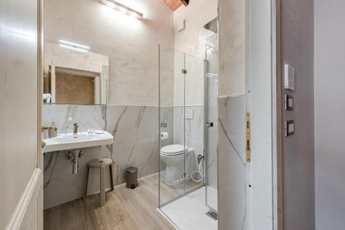 a bathroom with a glass shower and a sink at Il Borghetto Bed and Breakfast in Borgo San Lorenzo