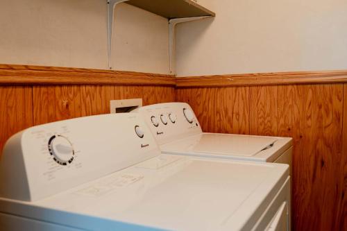 a white washer and dryer in a room at Kevins Place near PawPaw Lake in Watervliet