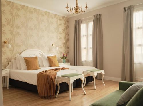 Кровать или кровати в номере Hotel Infanta Isabel by Recordis Hotels