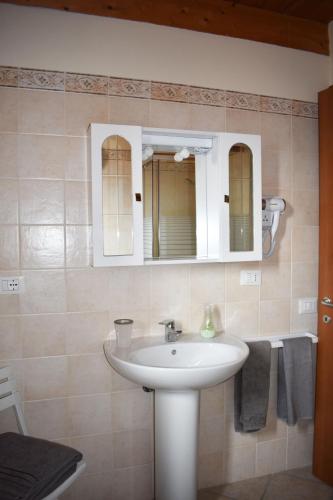 Koupelna v ubytování Residence La Pineta