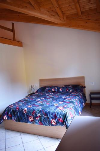 Postel nebo postele na pokoji v ubytování Residence La Pineta