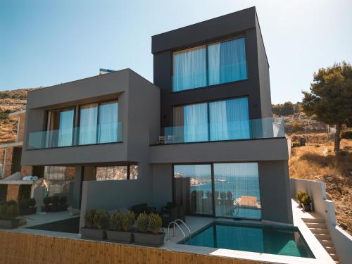 Bazén v ubytování Ionian Premium Villas nebo v jeho okolí