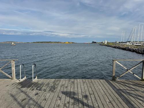 a dock with a view of a body of water at Villa Jan in Öckerö