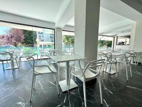 En restaurant eller et andet spisested på Vila Natalia