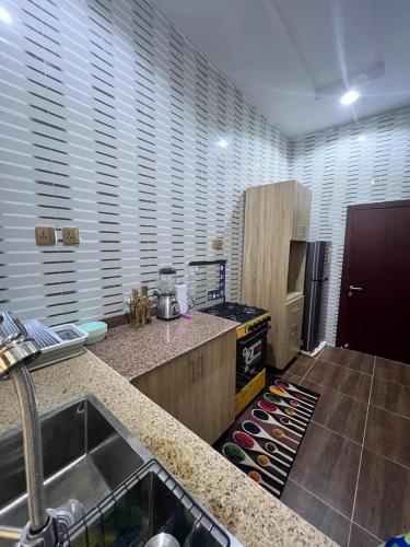 a kitchen with a sink and a counter top at Stunning and peaceful Home in Mama