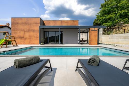 a house with a swimming pool at Casa Pianta in Buzet - Haus für 6 Personen in Buzet