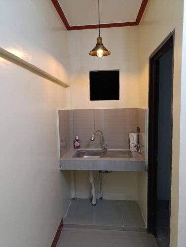 TV a/nebo společenská místnost v ubytování Jul'z Guest House