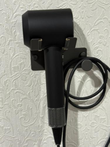 a black microphone attached to a wall at Wa Nagoya Station Business District Downtown 3-story Luxury House with Courtyard Garden 3 Bathrooms 2 Bathrooms 2 Parking Lots in Nagoya