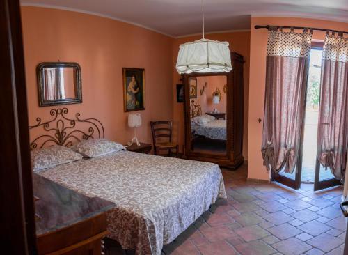 Ένα ή περισσότερα κρεβάτια σε δωμάτιο στο Casa Leandra