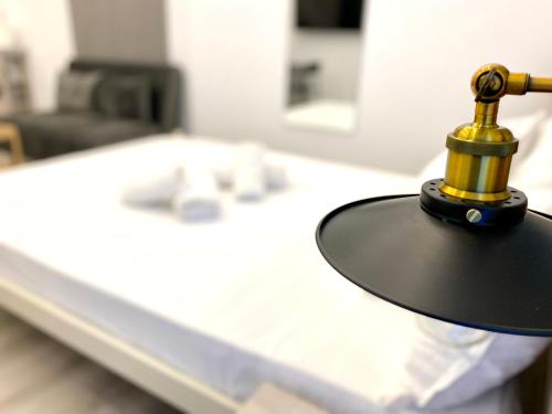 Ένα ή περισσότερα κρεβάτια σε δωμάτιο στο Mika Apt Very comfortable near City & beach