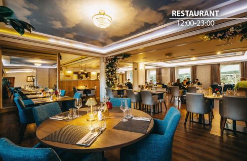 Reštaurácia alebo iné gastronomické zariadenie v ubytovaní Grand Hotel International - Czech Leading Hotels
