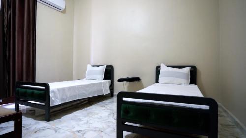 Ένα ή περισσότερα κρεβάτια σε δωμάτιο στο Dortoir 25 Constantine