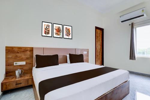 Ένα ή περισσότερα κρεβάτια σε δωμάτιο στο Hotel O DREAM INN