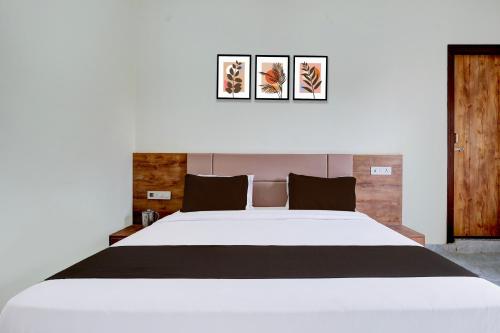 Ένα ή περισσότερα κρεβάτια σε δωμάτιο στο Hotel O DREAM INN