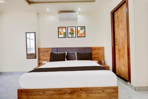 Ένα ή περισσότερα κρεβάτια σε δωμάτιο στο Hotel O DREAM INN