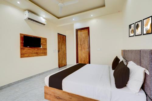 Ένα ή περισσότερα κρεβάτια σε δωμάτιο στο Hotel O DREAM INN