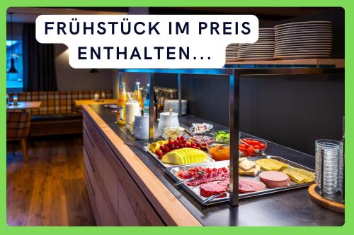 a buffet line with meat and vegetables on display at Landgasthof Linde - In ruhiger, ländlicher Umgebung in Deggenhausertal