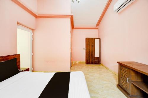Postel nebo postele na pokoji v ubytování Hotel O Amodam Resort