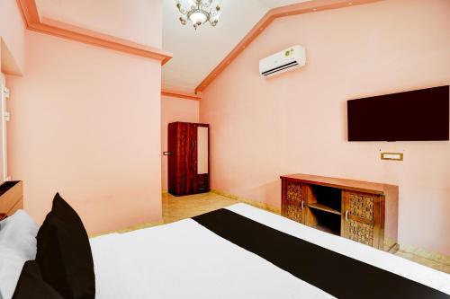 TV a/nebo společenská místnost v ubytování Hotel O Amodam Resort