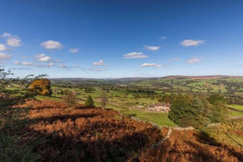 a view of the rolling hills of the countryside at Woolcombers in Addingham
