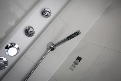 Vannituba majutusasutuses Ness Cottage