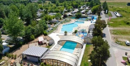 an aerial view of a resort with a swimming pool at Domaine De Dugny in Veuzain-sur-Loire