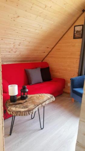 Posezení v ubytování Górska chata na Kaszubach - balia na wyłączność, sauna, klimatyczne miejsce