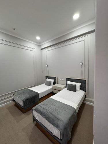 Postel nebo postele na pokoji v ubytování Emin hotel