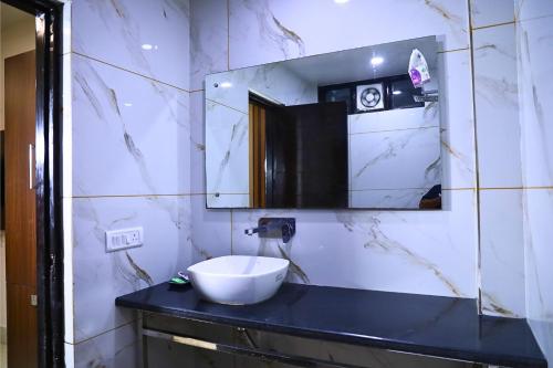 Ένα μπάνιο στο Hotel Good Palace Karol Bagh