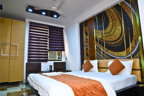 Ένα ή περισσότερα κρεβάτια σε δωμάτιο στο Hotel Good Palace Karol Bagh