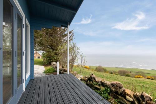 a view from the porch of a house at 1 Browcote Cottage in Ravenscar