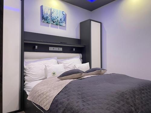 Postel nebo postele na pokoji v ubytování Hotel Pálma