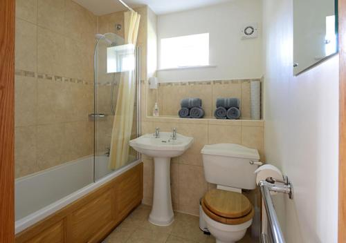 Koupelna v ubytování Mill Lane Farm Holiday Cottages