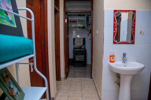 Ένα μπάνιο στο Amazing apartment in Milimani -Kisumu
