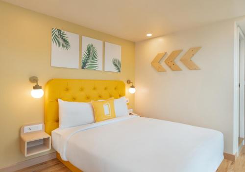 Voodi või voodid majutusasutuse Bloom Hotel - BKC Kalina toas